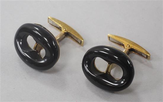 A pair of 18ct gold and black onyx cufflinks.